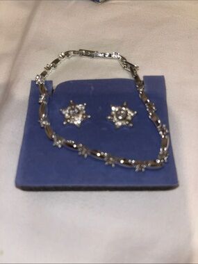 Avon sparking tennis bracelet and earrings